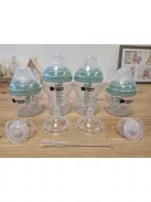 Tommee Tippee Natural cumisüveg kezdőszett 2x150ml, 2x260ml, kefe, 2db cumi, 2db etetőfej, OUTLET termék