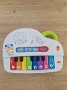 Fisher-Price  világító zongora babajáték, német nyelvű OUTLET termék