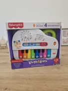 Fisher-Price  világító zongora babajáték, német nyelvű OUTLET termék