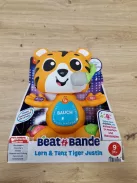 Fisher-Price Beat Bande Lern & Tanz Tiger Justin tanulójáték babáknak és kisgyermekeknek, német nyelvű kiadás OUTLET termék