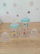 DODIE 4 db cumisüveg újszülötteknek, kerek anti-kólikás etetőcumival (2 x 150 ml és 2 x 270 ml) + 1 cumi újszülötteknek OUTLET termék