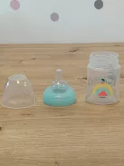 DODIE 4 db cumisüveg újszülötteknek, kerek anti-kólikás etetőcumival (2 x 150 ml és 2 x 270 ml) + 1 cumi újszülötteknek OUTLET termék