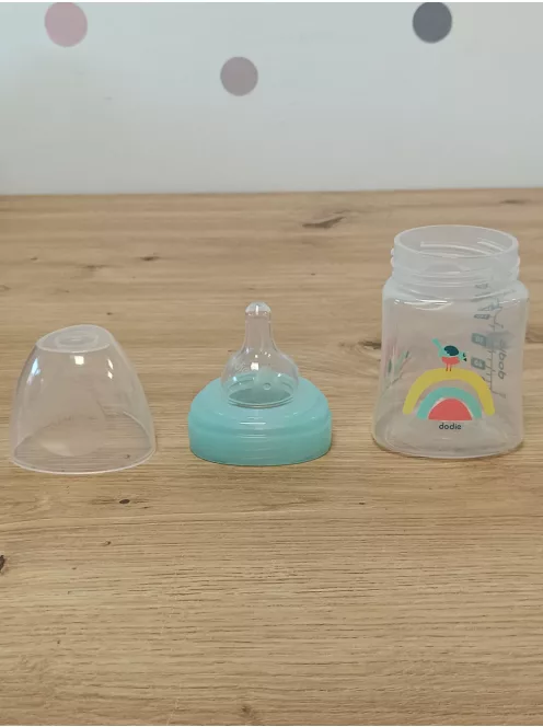 DODIE 4 db cumisüveg újszülötteknek, kerek anti-kólikás etetőcumival (2 x 150 ml és 2 x 270 ml) + 1 cumi újszülötteknek OUTLET termék