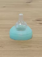 DODIE 4 db cumisüveg újszülötteknek, kerek anti-kólikás etetőcumival (2 x 150 ml és 2 x 270 ml) + 1 cumi újszülötteknek OUTLET termék