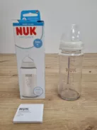 NUK First Choice+ cumisüveg  6–18 hónap hőérzékelős 240 ml csikóhal mintás OUTLET termék
