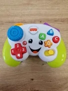 Fisher-Price Első konzol-távirányítóm zenével és fényekkel 6 hónapos kortól, többnyelvű változat: angol, olasz, portugál, spanyol OUTLET termék