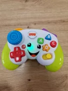 Fisher-Price Első konzol-távirányítóm zenével és fényekkel 6 hónapos kortól, többnyelvű változat: angol, olasz, portugál, spanyol OUTLET termék